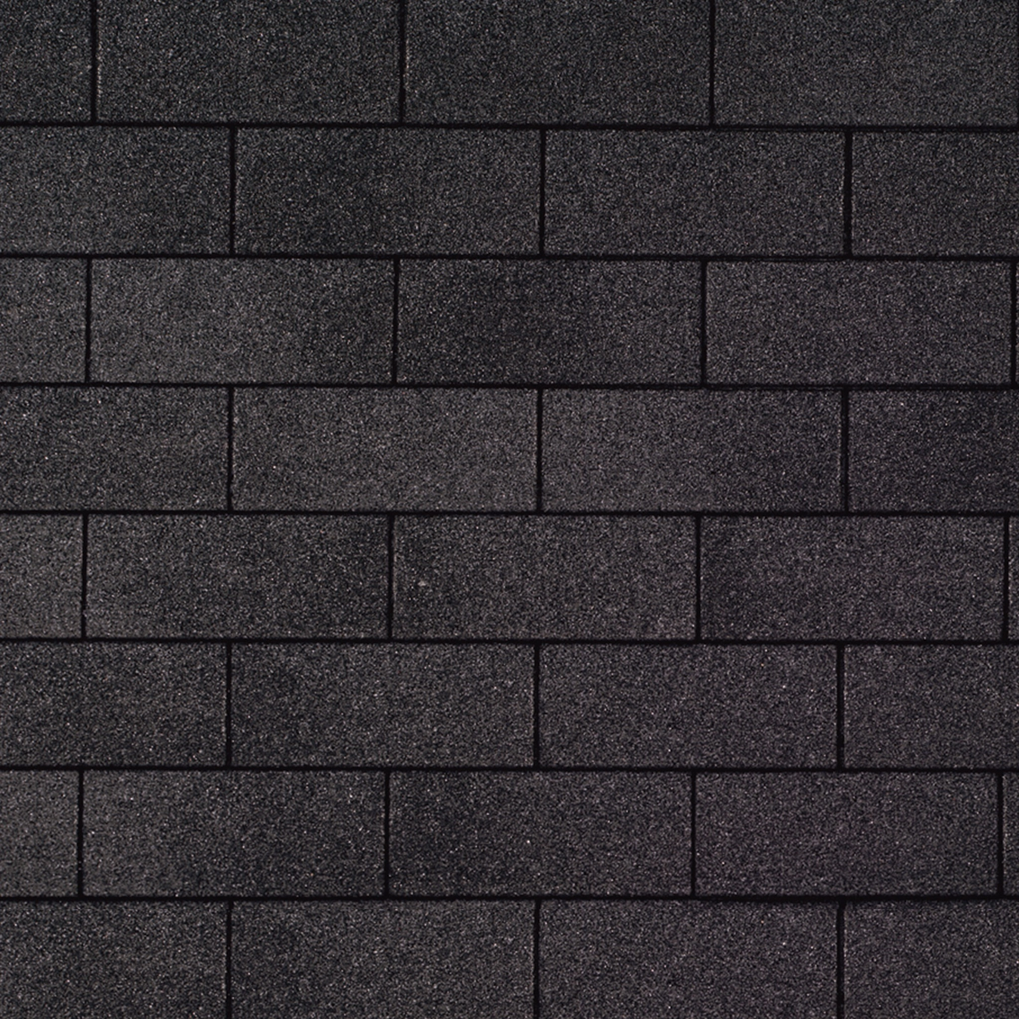 Dark gray asphalt shingles, reminiscent of Dual Black, are arranged in a uniform, overlapping pattern on the roof.